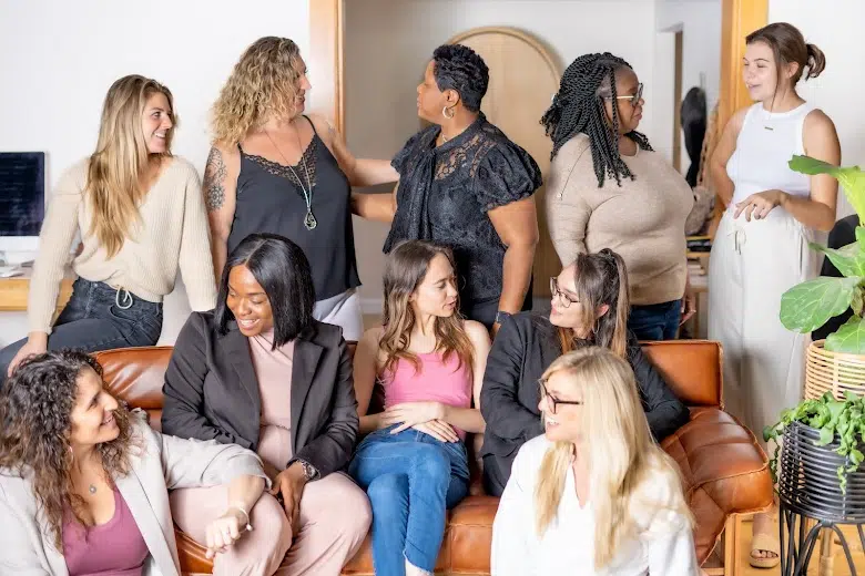 A group of ladies talking to each other