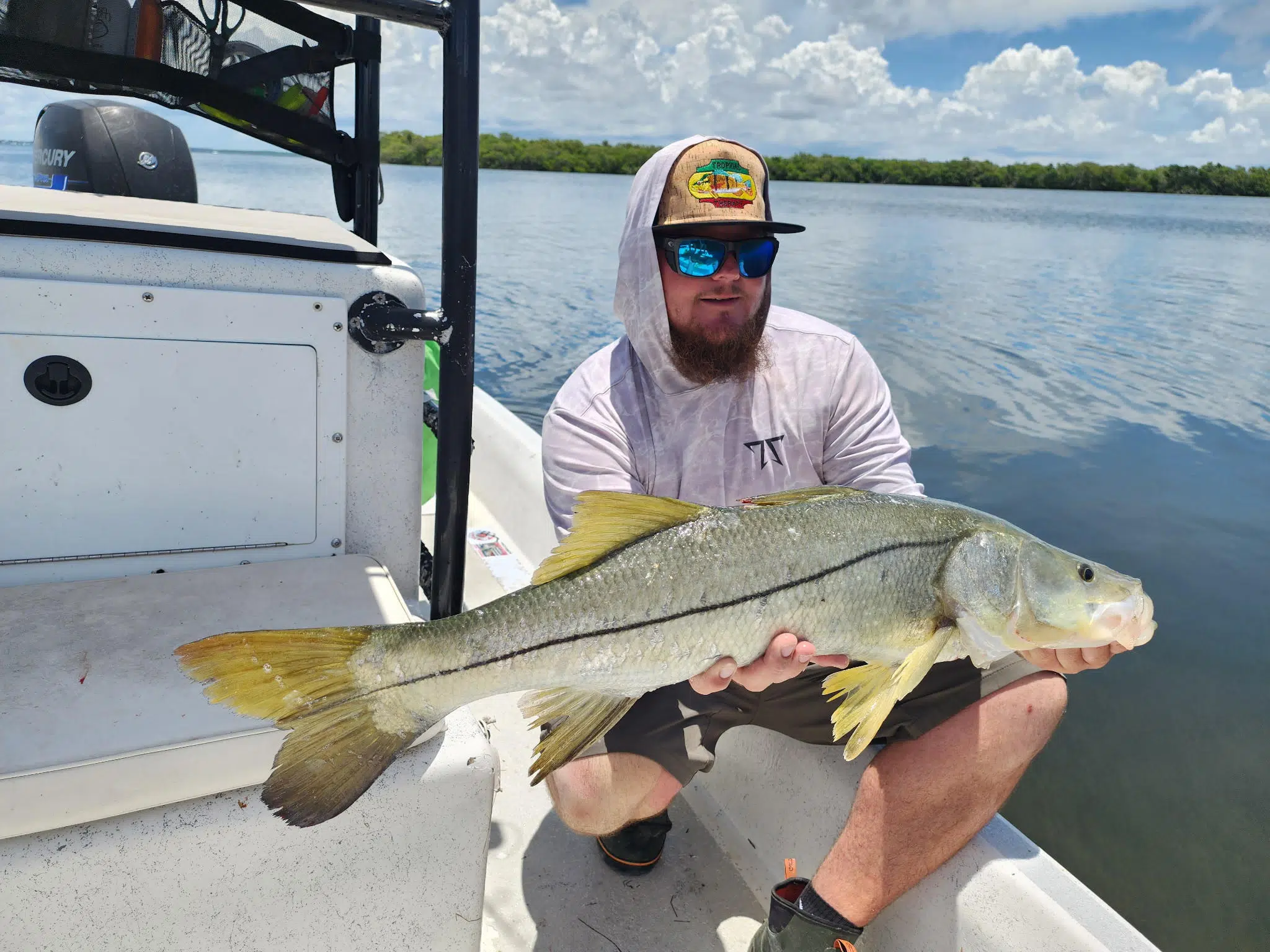 man holding a fish