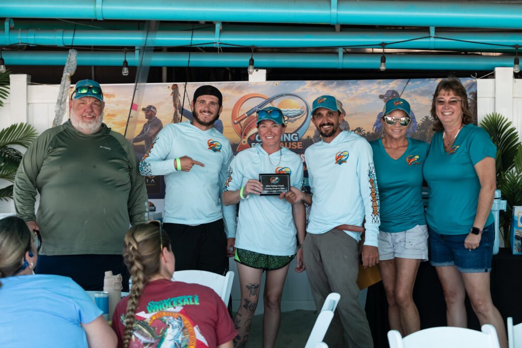 A group of fishermen getting an award